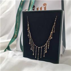Gold-tassel-necklace