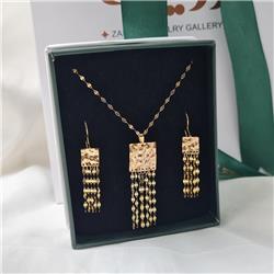Gold-hammered-set-with-a-tassel