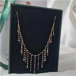 Gold-tassel-necklace