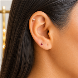 gold-cartilage-triangle-piercing