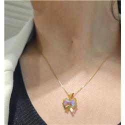 Gold-bow-tie-pendant