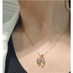 Gold-bow-tie-pendant