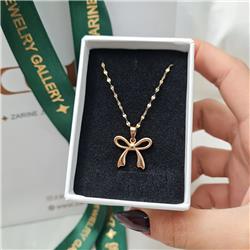 Gold-bow-pendant