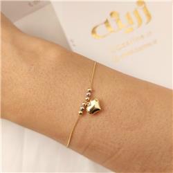 Gold-ball-and-heart-bracelet