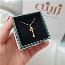 Gold-key-pendant