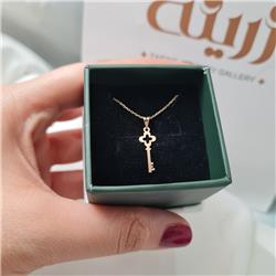 Gold-key-pendant