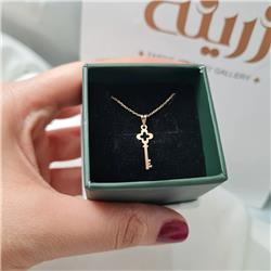 Gold-key-pendant