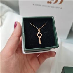 Gold-key-pendant