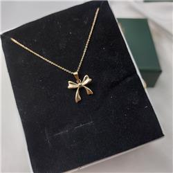 Gold-bow-pendant