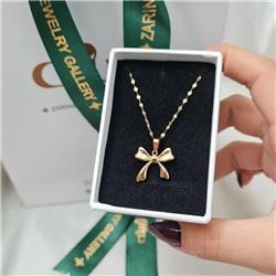 Gold-bow-pendant