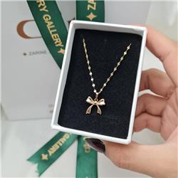 Gold-bow-pendant