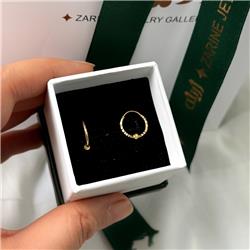 Gold-hoop-earrings-with-ball-cut