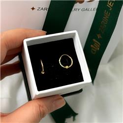 Gold-hoop-earrings-with-ball-cut