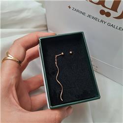 Wave-earrings-with-balls