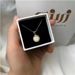 Gold-and-shell-pendant