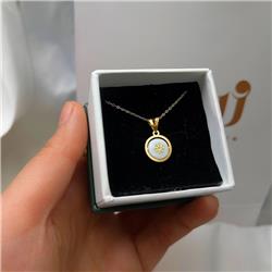 Gold-and-shell-pendant