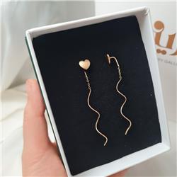 Gold-earrings-with-a-heart-shape