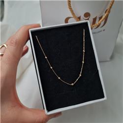Al-Barnado-gold-ball-necklace