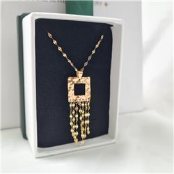 Gold-hammered-tassel-pendant