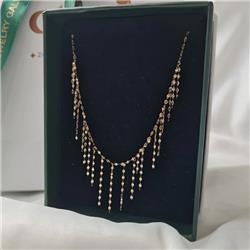 Gold-tassel-necklacE