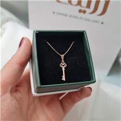 Gold-key-pendant
