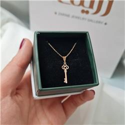 Gold-key-pendant