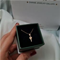 Gold-key-pendant