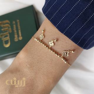 دستبند طلا گوی تراش و سه ونکلیف 